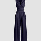 Jótékonyság | Elegáns ujjatlan, bő szárú overál